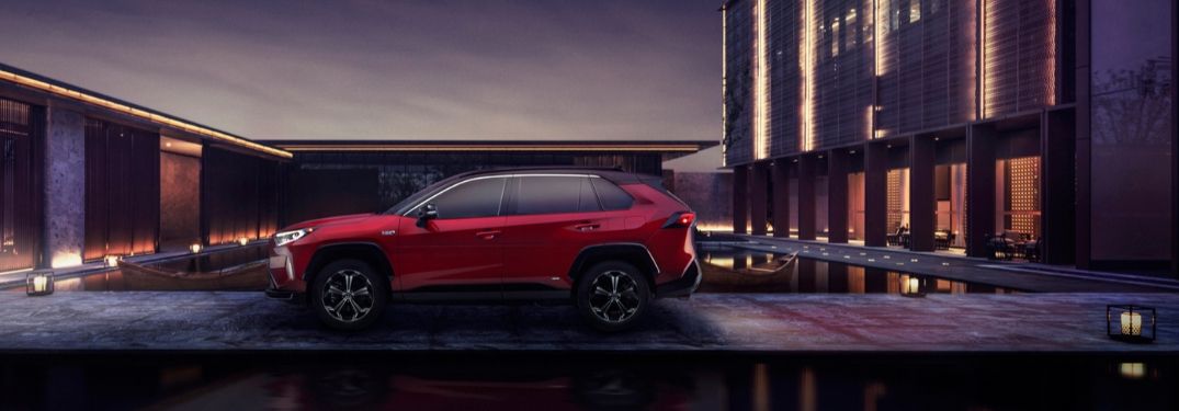 Red 2021 Toyota RAV4 Prime Side Exterior in a Driveway