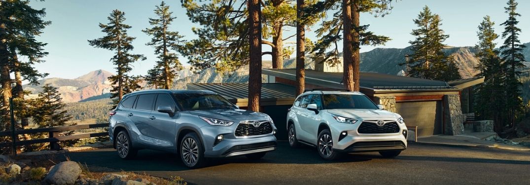 Blue and White 2020 Toyota Highlander Models at a Mountain Cabin