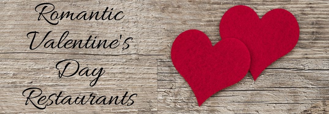 Two Red Hearts on a Wood Background with Black Romantic Valentine's Day Restaurants Text