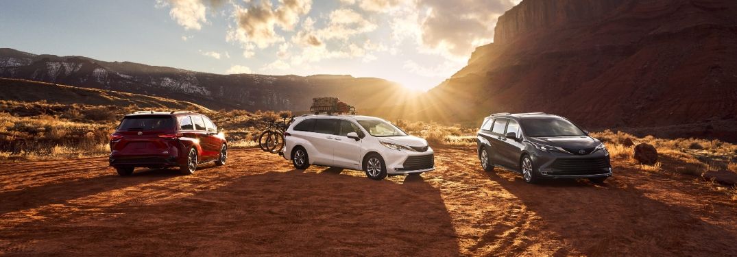 Red, White and Gray 2021 Toyota Sienna Models in a Desert