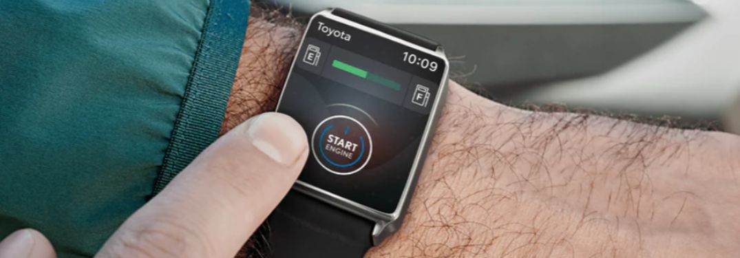 Close Up of Man Using Toyota Remote Connect on a Smartwatch