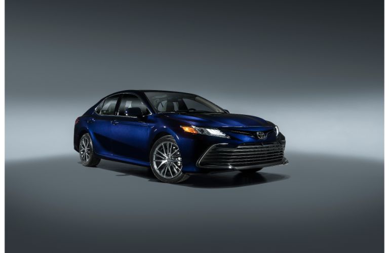 Blue 2021 Toyota Camry on Dark Background