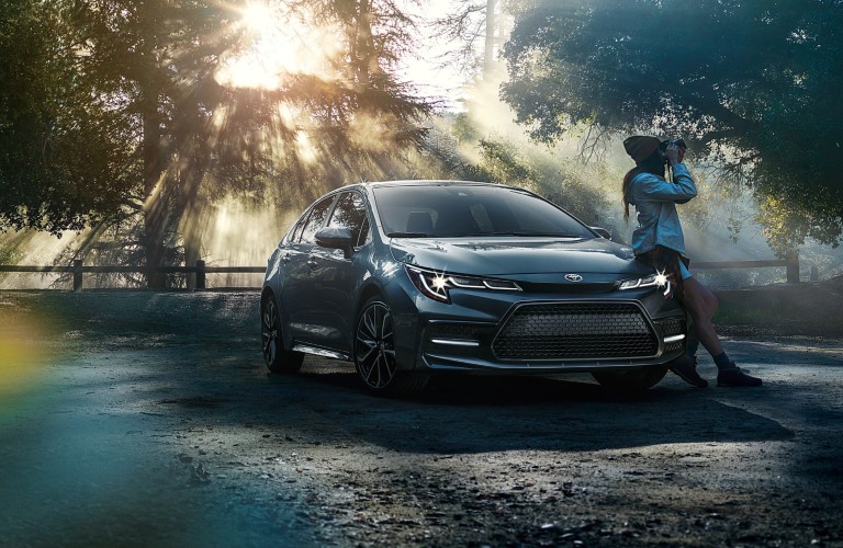 Blue 2021 Toyota Corolla on a Street at Night