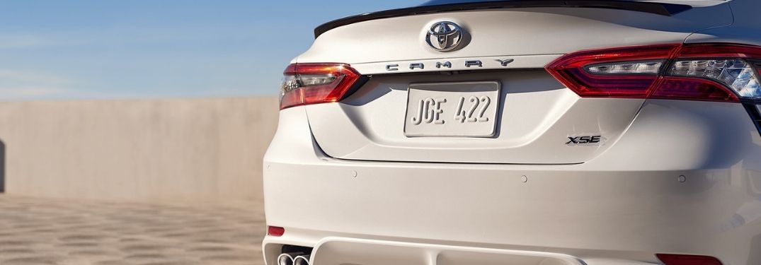 Close Up of White 2021 Toyota Camry XSE Rear Exterior on a Track