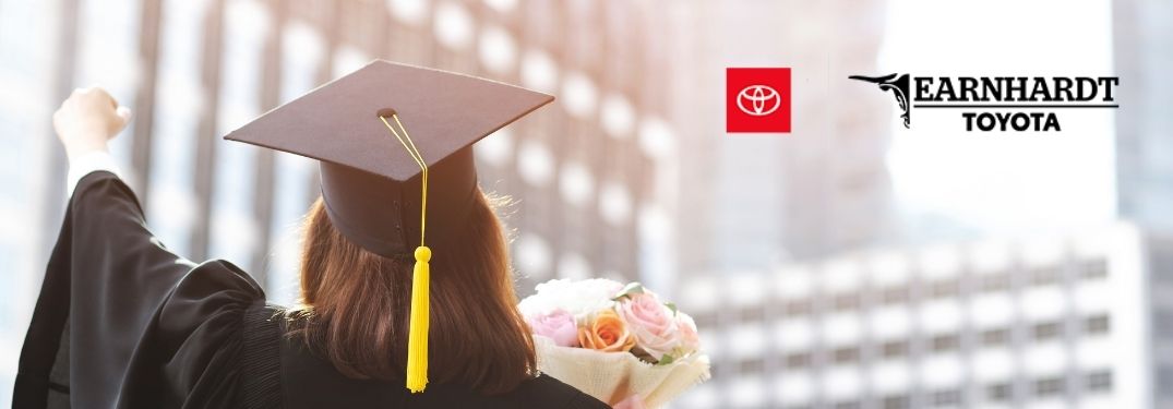 Woman in Black Cap and Gown with Earnhardt Toyota Logo