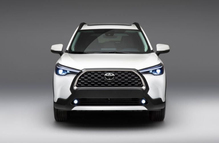 White 2022 Toyota Corolla Cross Front Grille on Light Background