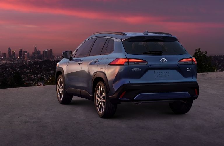 Gray 2022 Toyota Corolla Cross Rear Exterior at Sunset
